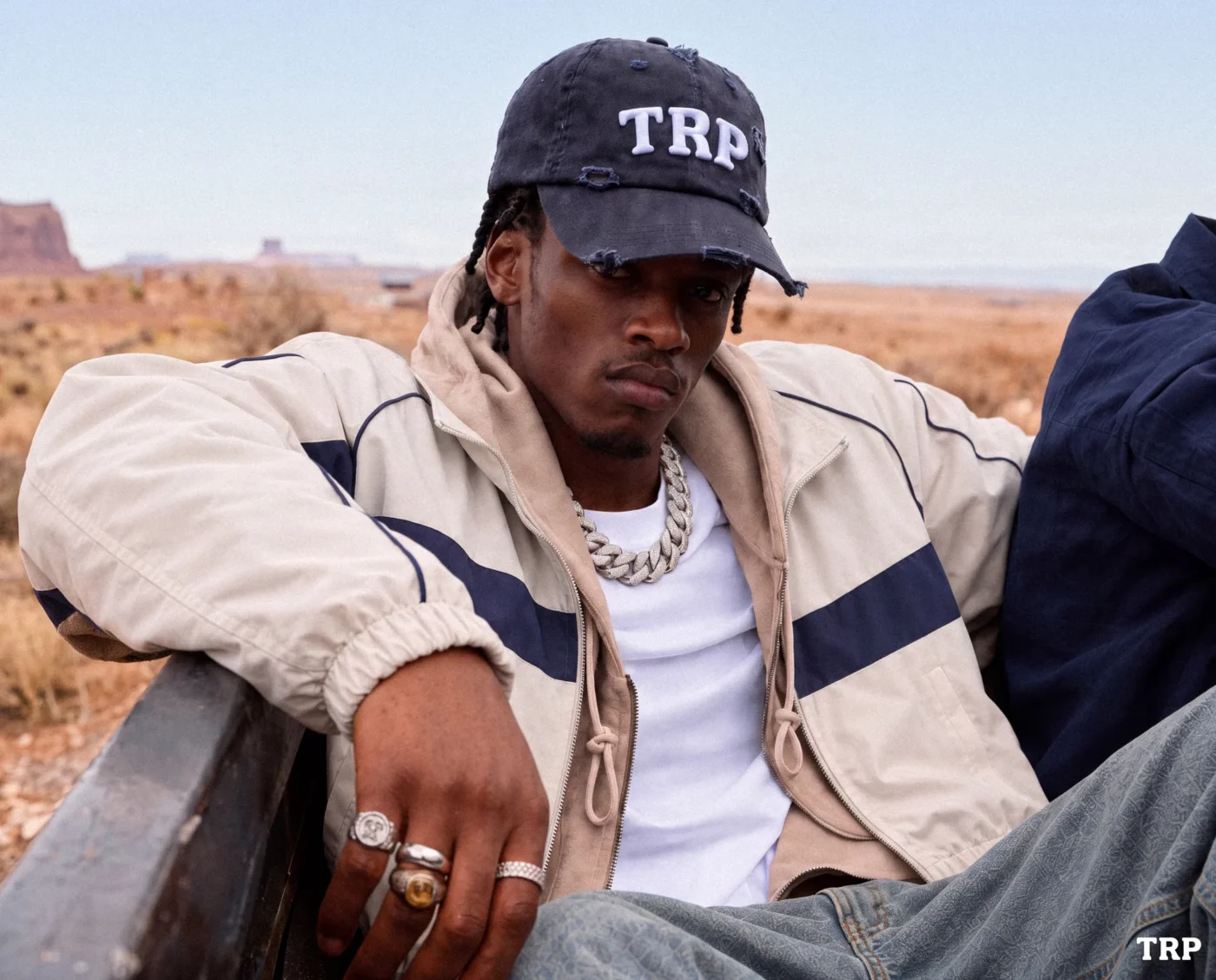 Beige TRP track jacket with navy panels